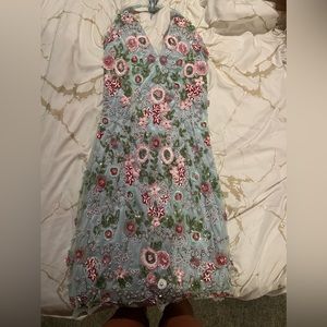 Size 4. Worn once by previous owner. Bought for event and never wore.